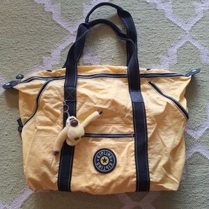Kipling Tan Travel Duffel with Black Handles